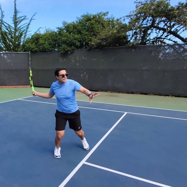 Tennis coaching moment on court