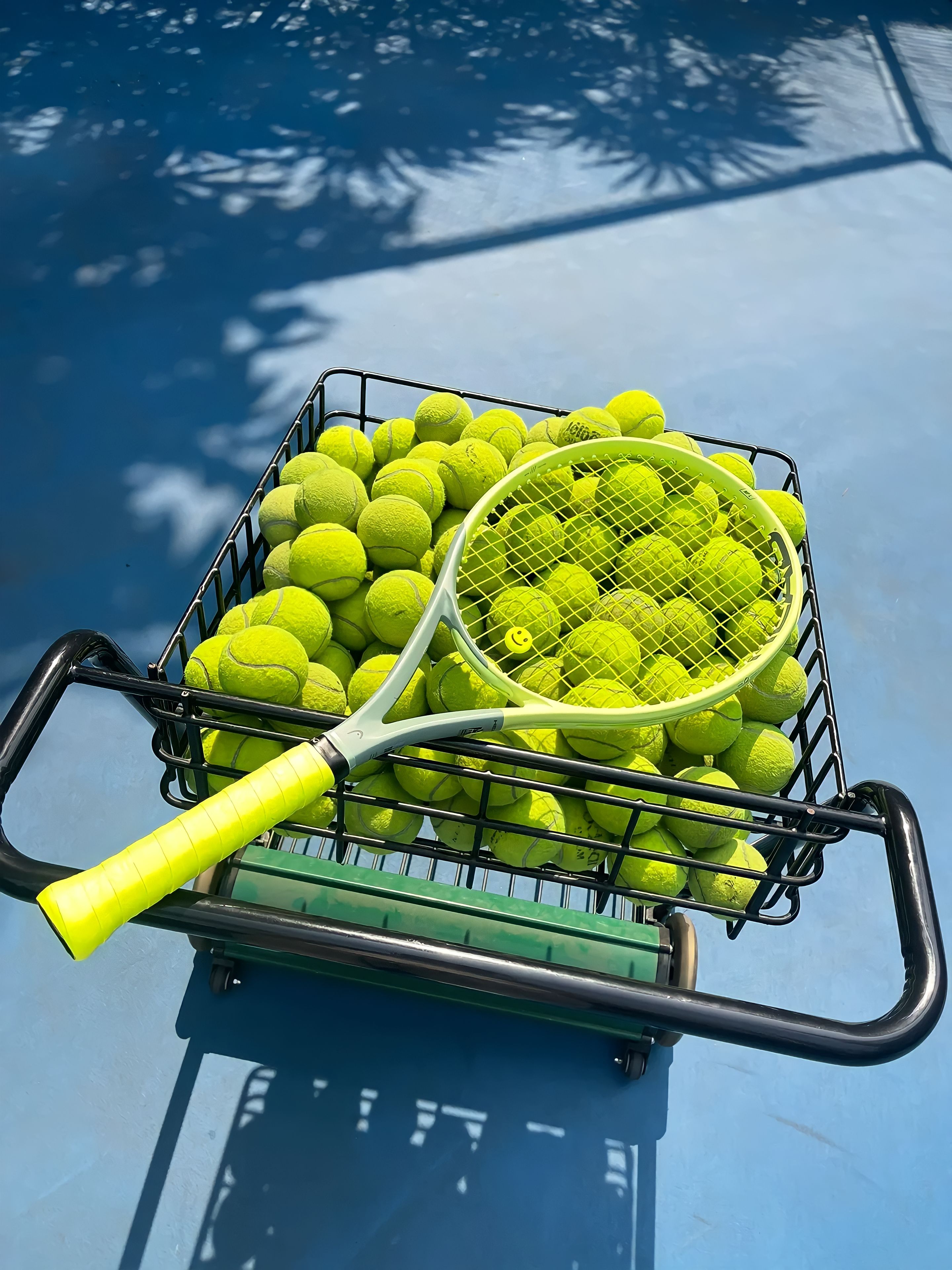 Tennis rackets and balls ready for a lesson